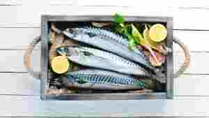 Mackerel,On,A,White,Wooden,Background.,Raw,Fish,Top,View.