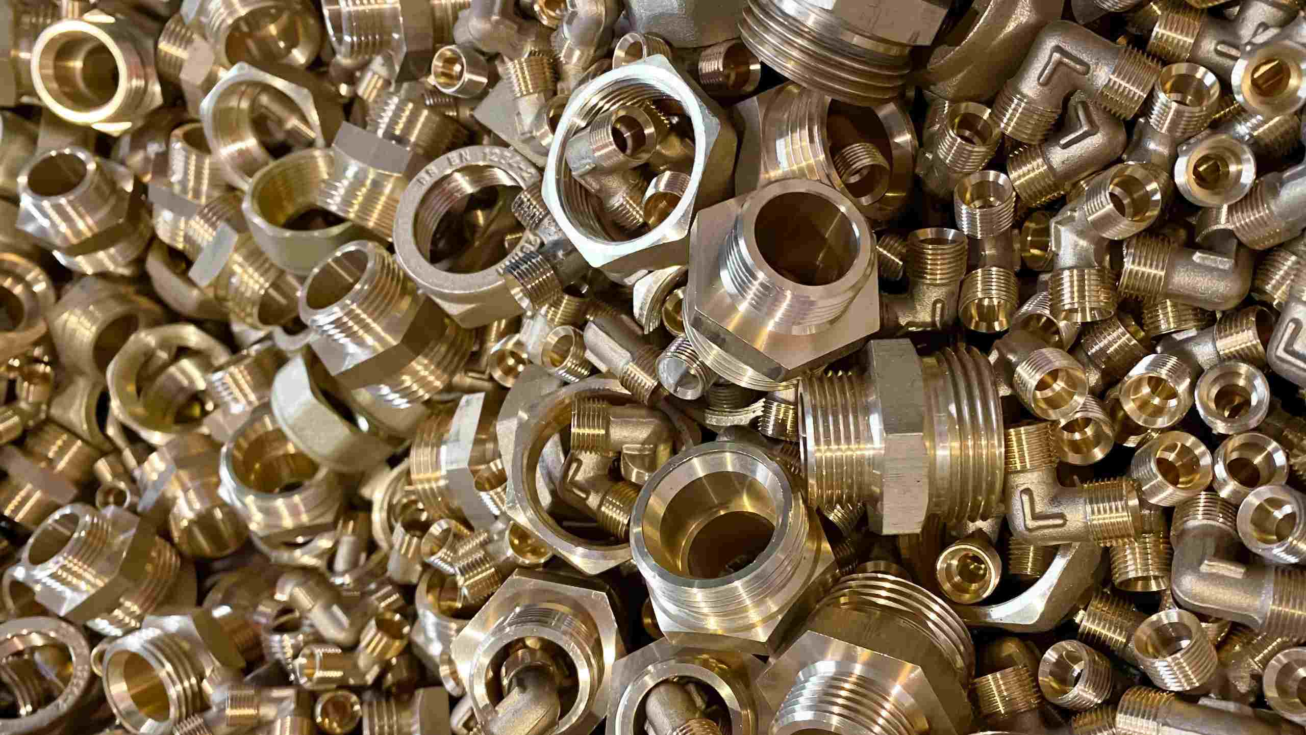 New,Brass,Nuts,And,Fittings,For,Plumbing,Use,Or,Recycling.